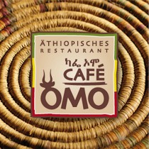 Logo von Restaurant Caf Omo in Mnchen